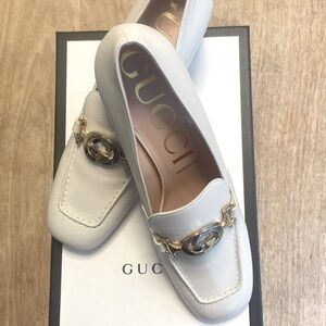 Gucci Mystic White leather loafers with Zumi detail buckle. Brand new.